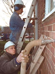 Installing cavity wall insulation