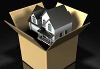 A house being packed in a cardboard box