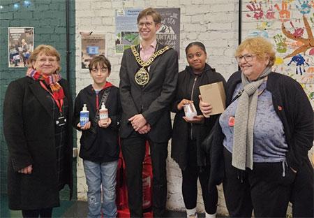 Image of 2 young people with the mayor of Haringey and 2 councillors.