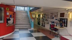 Foyer of the Northumberland Park Resource Centre. There is a reception desk and a flight of 13 stairs