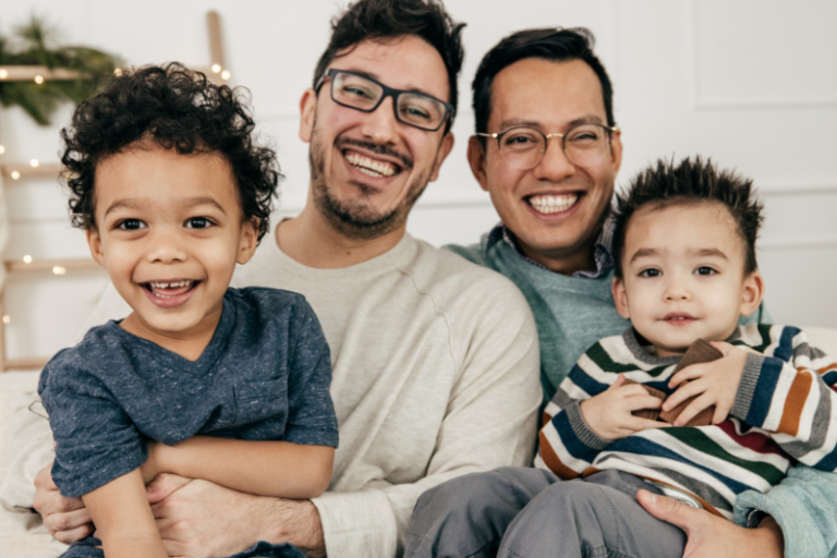family with two dads and their young children