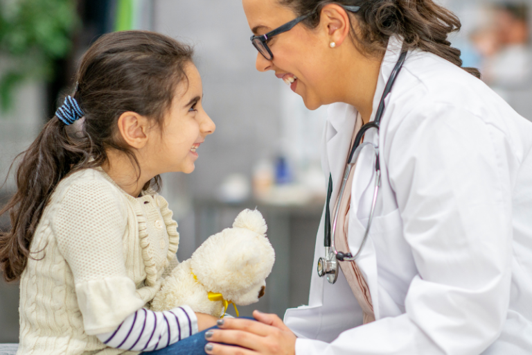 Young child with a GP in a clinic setting