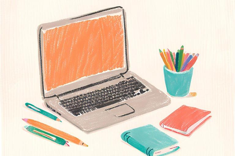A laptop and some stationery