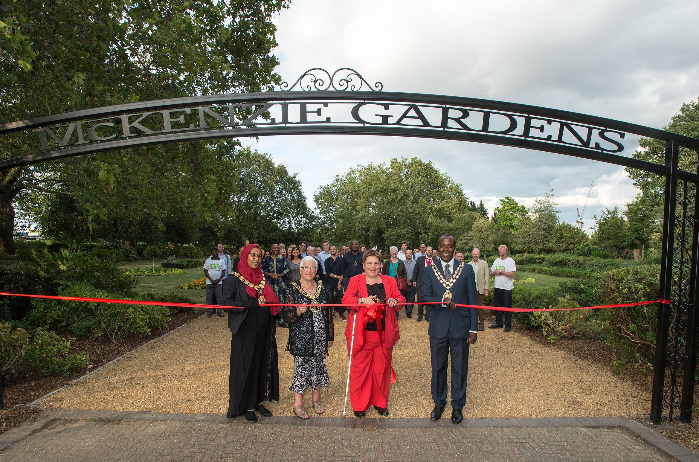 Group of people cutting a ribbon in Finsbury Park