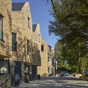 Beacon Lodge - photo showing new build housing next to retained and restored existing
