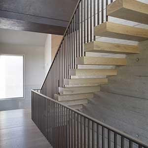 Kenwood Lee House - photo showing cantilevered stairs in the house