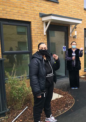 A Haringey resident with the keys to their new home