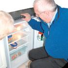 Man checking the fridge