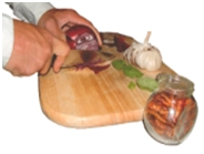 Chopping vegetables on a board