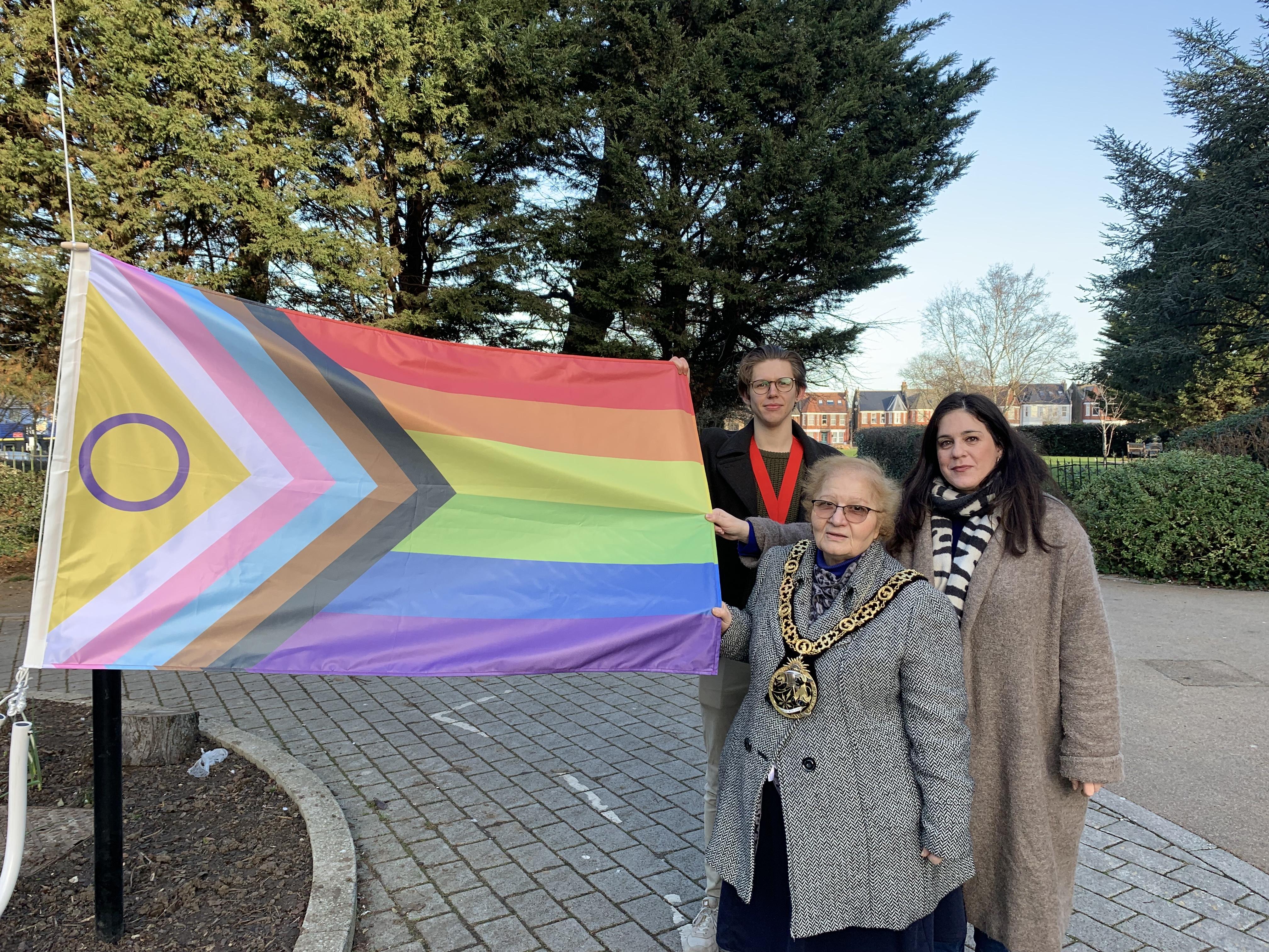 Cllr Peray Ahmet, Cllr Lester Buxton and Cllr Gina Adamou with the Progress Flag