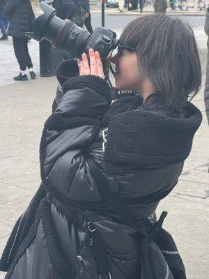 image of young person looking into a camera lens