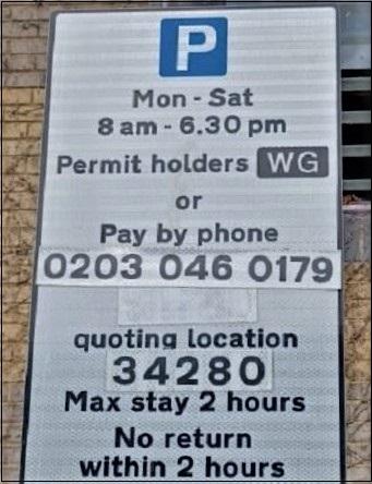 Parking sign saying permit holders, showing a P in a blue square and times for parking