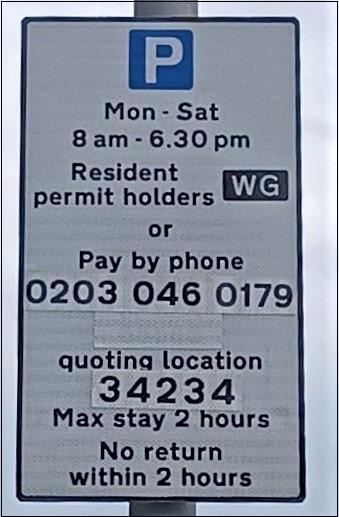 Parking sign showing a P in a blue square, times for parking and pay-by-phone