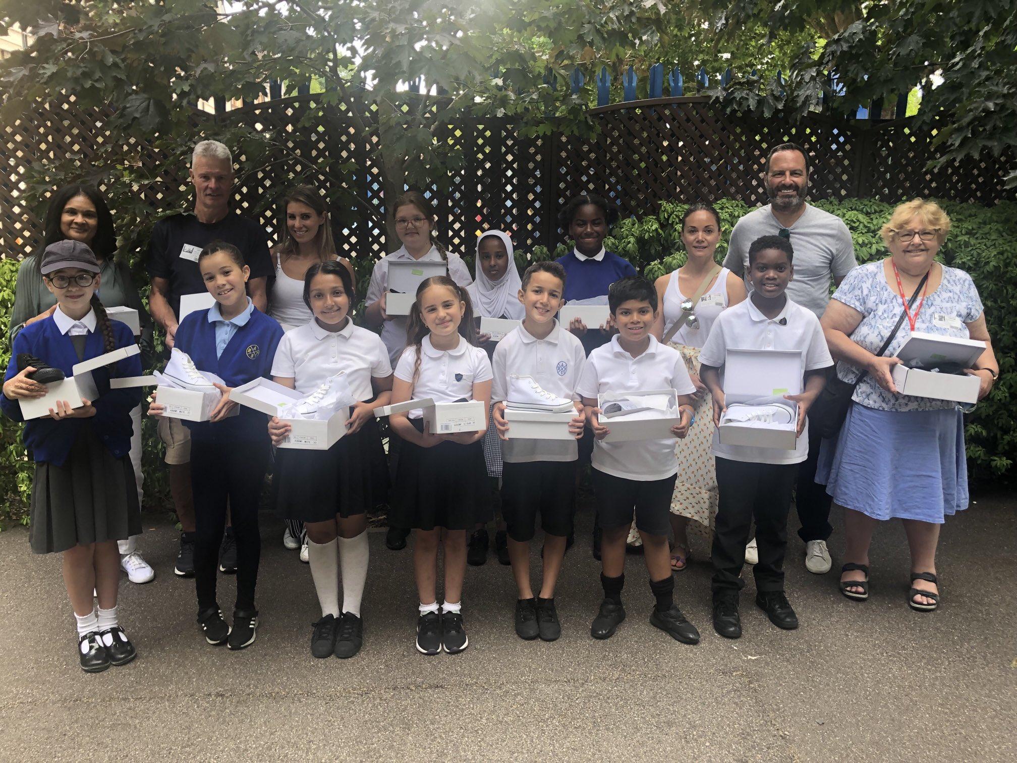 A picture of Haringey Council's Cabinet Member for Children, Schools & Families, Cllr Zena Brabazon, & Debra Reiss Foundation representatives with pupils, parents & staff at Risley Avenue Primary School.