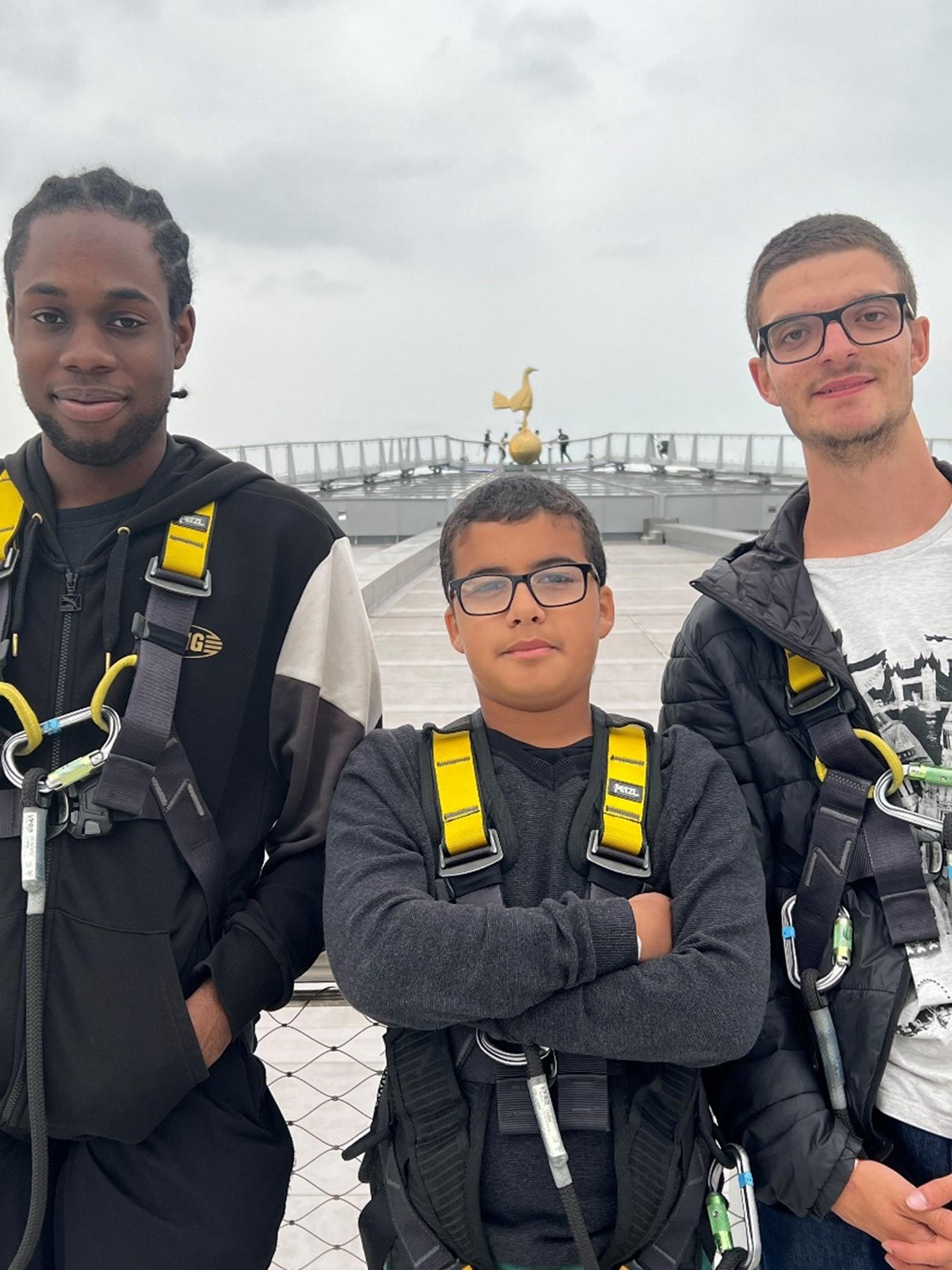 Image of 3 young people standing at the top of the Tottenham Dare Skywalk