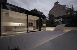the beautifully detailed black glass and steel extension from the equally elegant courtyard