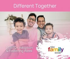 Foster family comprising of two male carers and two young children, gathered together, smiling